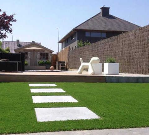 Artificial grass lawn with paving
