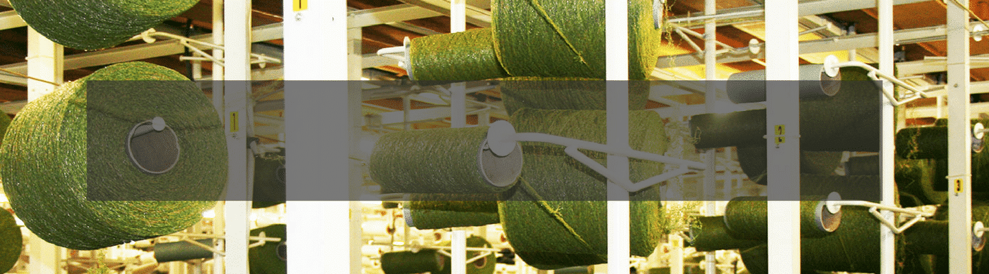 artificial grass yarns on a roll in factory