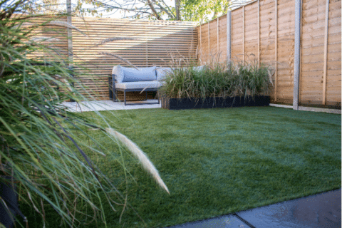 artificial grass installed in modern garden