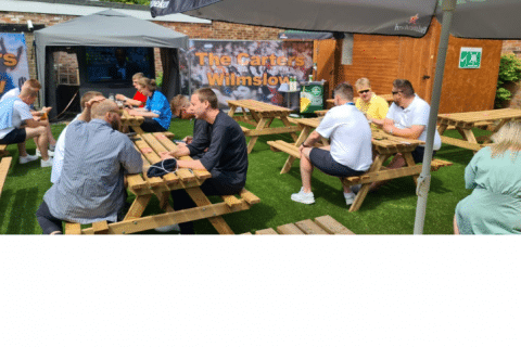 fake grass outdoor pub seating area